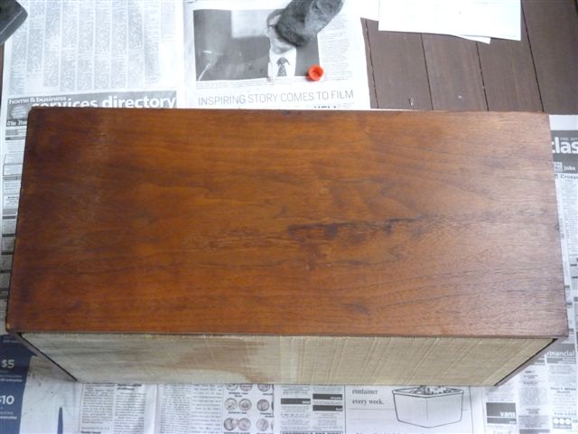 Side of a speaker cabinet before restoration