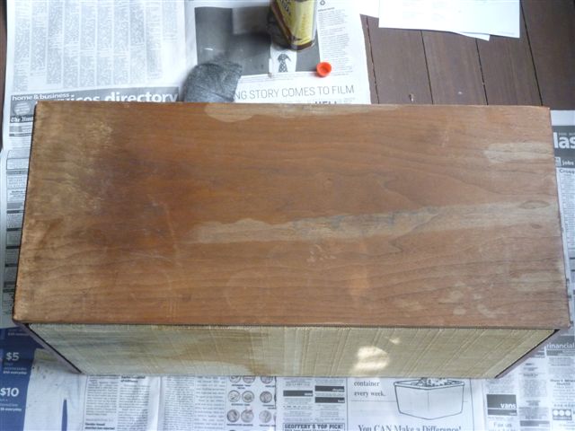 Side of a speaker cabinet before restoration